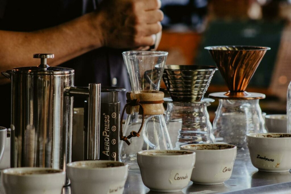 different style of coffee glass kettles placed in a row