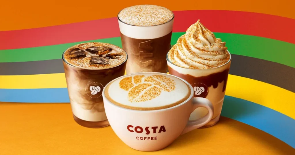  coffee shop brands Costa coffee cups filled with coffee with a rainbow background