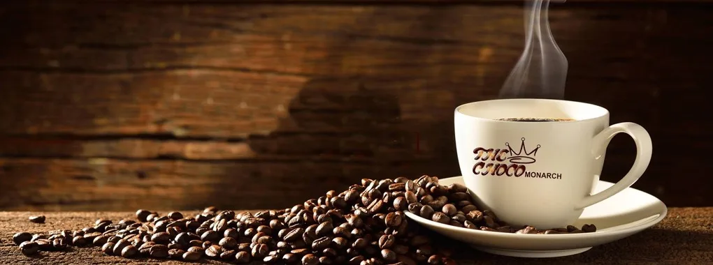 The Choco Monarch coffee cup placed with coffee beans