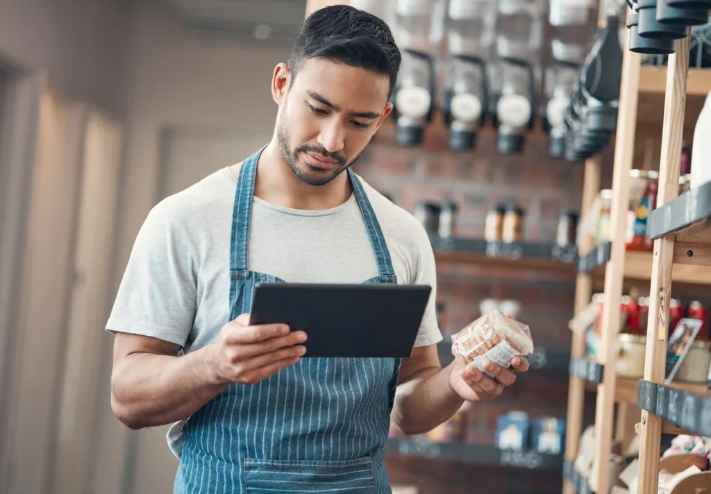  a man doing cafe inventory management